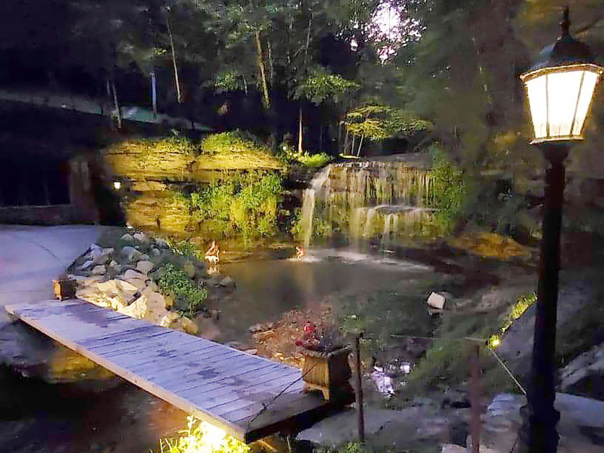 Wooden footbridge crossing the creek below Old Falls