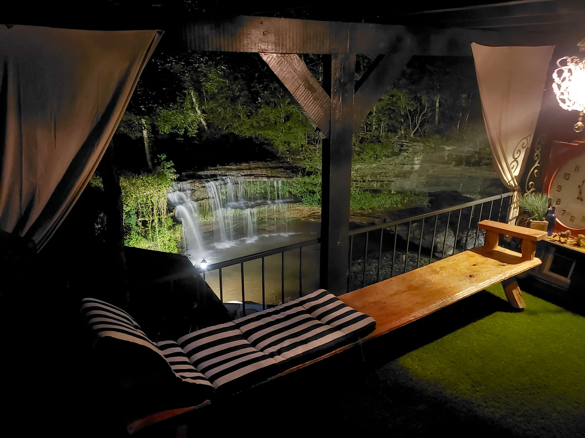 Covered deck overlooking the waterfall
