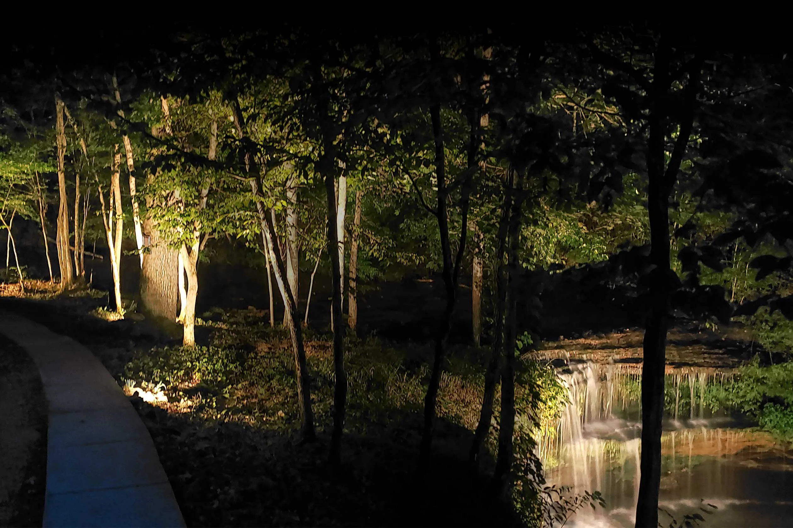 Old Falls seen from the porch, water breaking white over the rock face